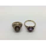 A 9ct gold amethyst ring and an unmarked smoky qua