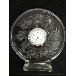 A Lalique glass mantle clock decorated with two le