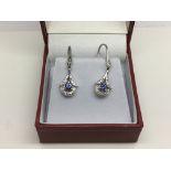 A pair of 18ct white gold diamond and tanzanite ea