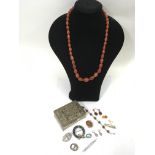 A small group of costume jewellery including silve