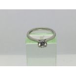 A platinum solitaire diamond ring, approx 0.41ct,