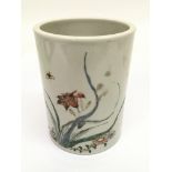 A Chinese famille rose brush pot painted with a fl