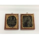 Two framed daguerreotype family portraits.