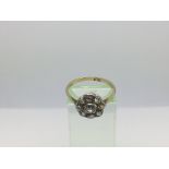 An 18ct gold diamond cluster ring, approx 1ct, app