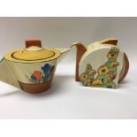 Two Clarice cliff tea pots decorated with crocus f