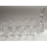 A crystal glass drinks set comprising a decanter,