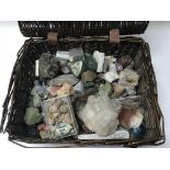 A basket containing a collection of semi precious