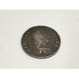 A 1662 Crown coin.