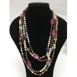 Two very long, coloured cultured pearl necklaces