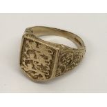 Another gent's 9ct gold signet ring with three lio