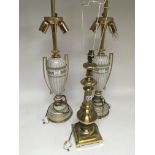 Two Quality modern porcelain and gilt metal lamps and a brass table lamp sold with shades for