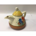 A Clarice Cliff crocus pattern teapot. Height appr