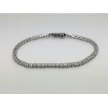 A 9ct white gold diamond bracelet, approx .54ct an