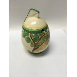 A Clarice cliff preserve pot decorated in the secr