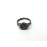 A small cast metal ring, possibly medieval, approx