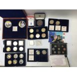 A collection of various coins and sets including R