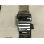 A boxed Gucci watch with squared black dial and st