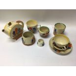 A group of Clarice Cliff pieces to include a teapo