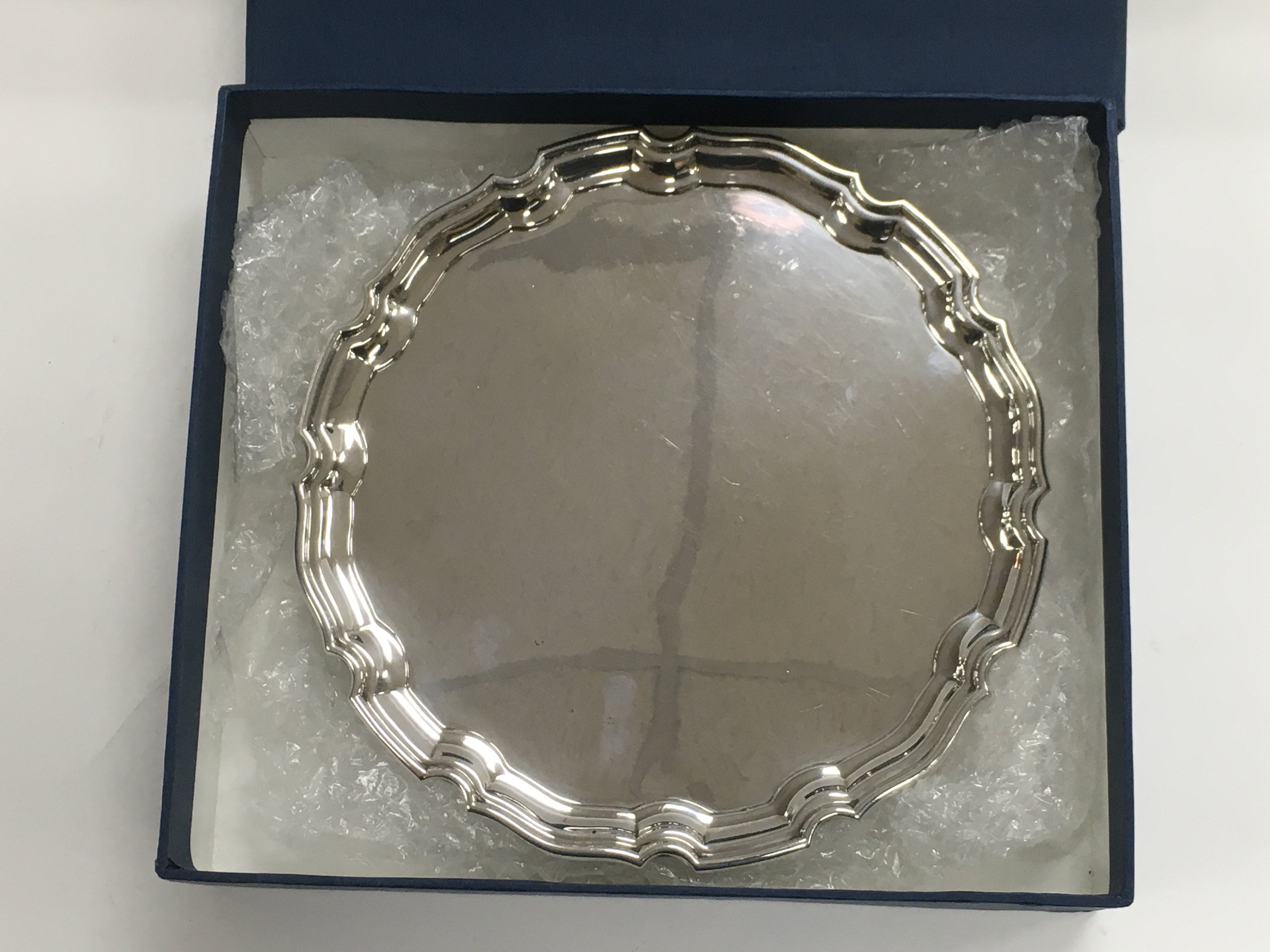 A boxed silver Garrod's & Co salver with a shaped