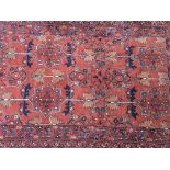 Two hand knotted Middle Eastern rugs with a reaped