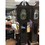 A reproduction grandmother clock with rotating dial depicting ships, sun and moon, approx height