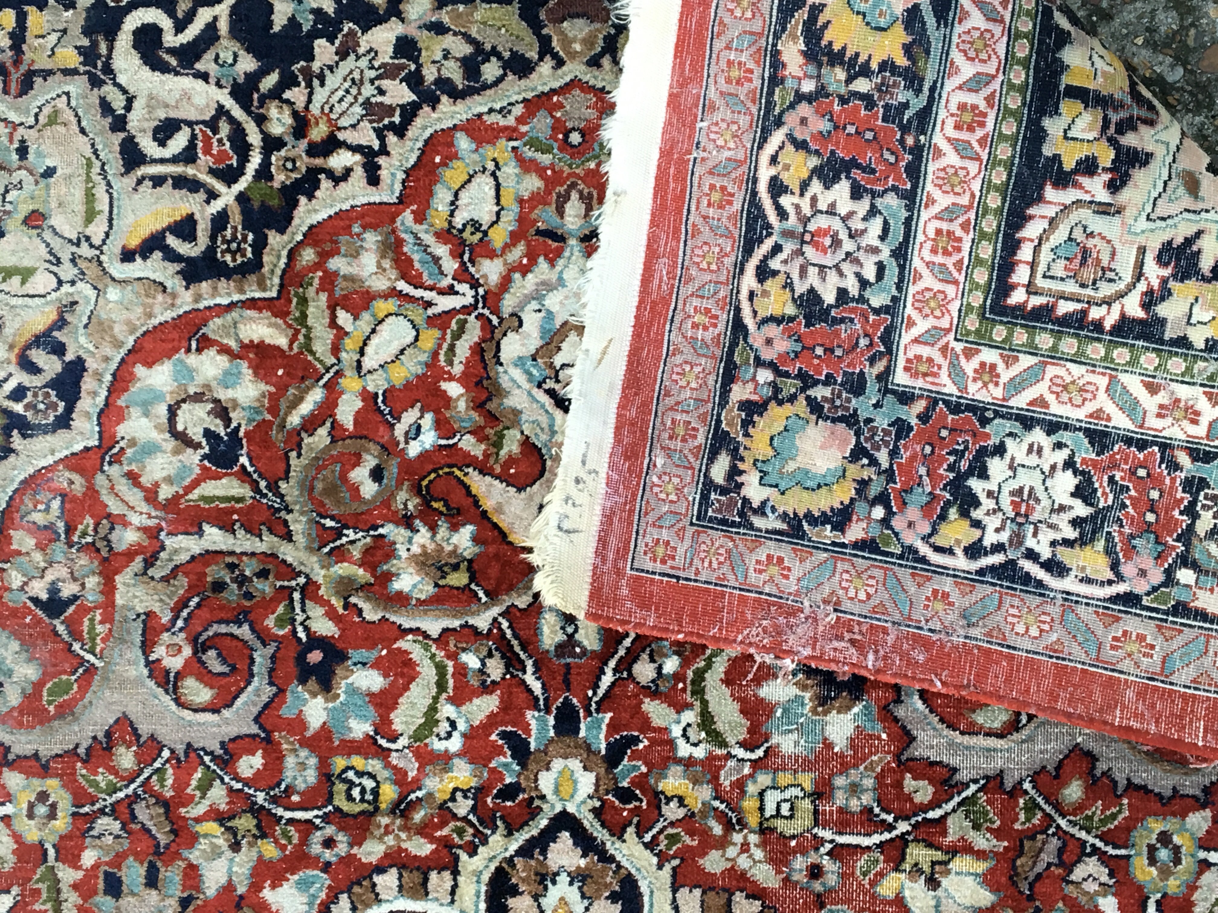 A Persian part silk hand knotted rug with a floral - Image 4 of 4