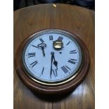 A late 19th century mahogany wall clock