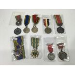 A group of ten mixed medals including Thailand, En