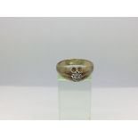 A 9ct gold gent's diamond gypsy ring, approx 5.8g