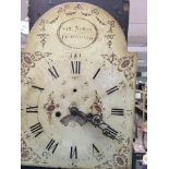A oak carved case long case clock the painted dial