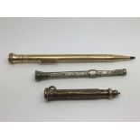 Three pencils including a silver Victorian example