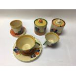A group of Clarice Cliff items including crocus pa