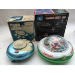 Flying saucers, boxed , battery operated, tinplate