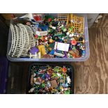 A large collection of playmobil play people and set accessories