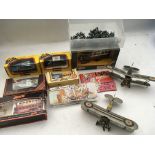A box containing a collection of boxed Diecast veh
