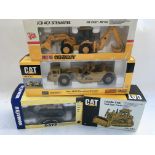 A collection of boxed Diecast earth moving vehicles including Joal compact JCB 4CX sitemaster, CAT