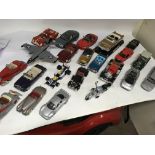 A collection of 1:24 and 1:18 scale Diecast vehicles including cars, bike etc, all unboxed