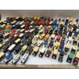 A collection of loose die cast vehicles including