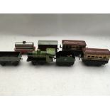 Clockwork, Tinplate , O gauge train , including locomotive, carriages and rolling stock