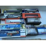 A collection of boxed diecast vehicles, including