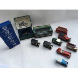 A collection of boxed and loose Diecast vehicles including Lledo, Corgi, Ixo Aston martin and a
