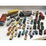 A collection of loose playworn Diecast vehicles including Corgi, Dinky, Matchbox etc