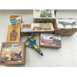 A collection of boxed tinplate reproduction clockwork/ battery operated toys, including Retro
