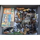 A box containing a collection of Diecast Zoo animals, including Britains