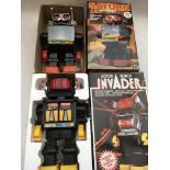 Saturn robot and Action Invader robot, both plasti