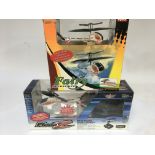 Two boxed remote control helicopters