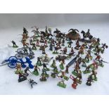 A collection of loose Diecast and plastic Wild West figures including Britains Detail etc