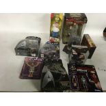 A box of carded and boxed figures including Star W