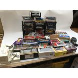 A collection of boxed diecast vehicles including D