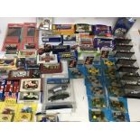 A collection of boxed and carded diecast vehicles